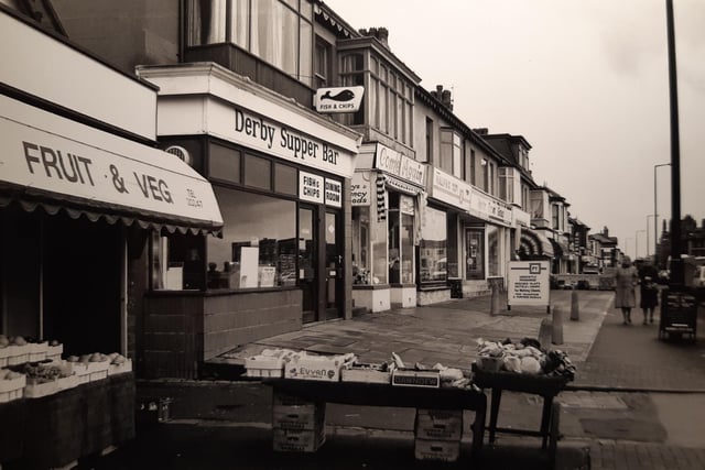 Derby Supper Bar, a fancy goods shop, greengrocers and the Halifax can be seen in this 1980s picture