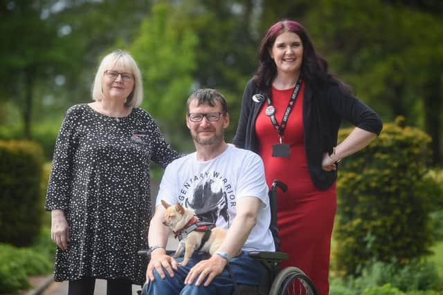 Long lost cousins Reece Slater and Angy Smith reunite at Slimming World in Fleetwood. They are pictured with Slimming World consultant Kat Carter.