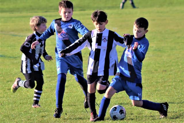 Action from our under-10s match of the week between FC Rangers and Wyre Junior Whites  Pictures: B&DYFL