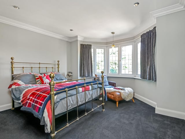 This is Rathgar. A four bedroom home in Portsdown Hill Road, Bedhampton, that is on sale for £1.19m. It is listed by Fine and Country.