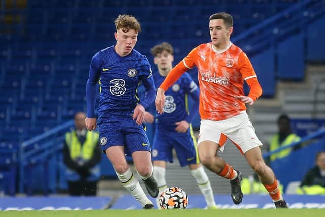 Jake Daniels in possession as Chelsea's Brodi Hughes looks on during Chelsea Under-18 vs Blackpool Under-18, FA Youth Cup Football at Stamford Bridge, February 2022