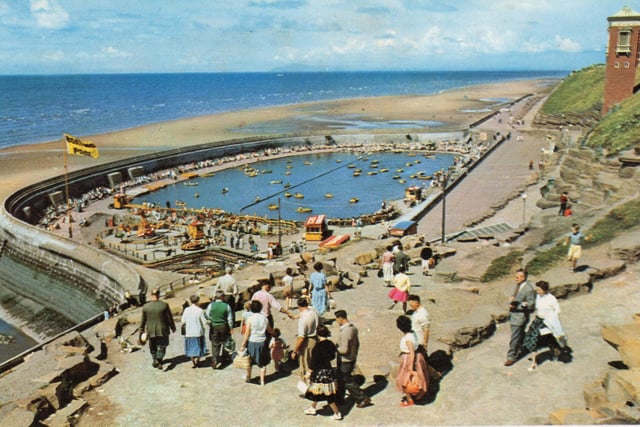 Crowds flock to the Open-Air Boating Pool at North Shore in the 1950s. If they didn’t fancy the steep trek back up the cliffs, the brick-built Cabin Lift on the right would take them back to promenade level for a few pence paid to the attendant. Photo: Saidman Bros/Barry McLoughlin collection