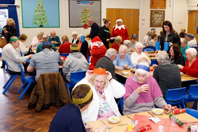 Guests tuck into the Christmas lunch at Manor Beach Primary School