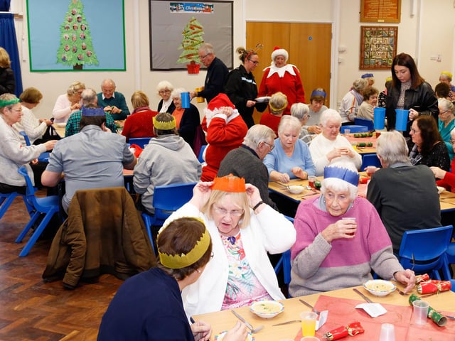 Guests tuck into the Christmas lunch at Manor Beach Primary School