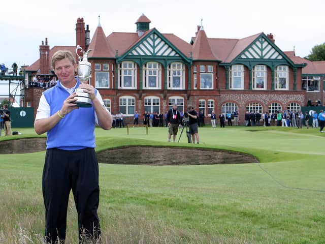 South Africa's Ernie Els lifts the Claret Jug and celebrates winning the 2012 Open Championship at Royal Lytham and St. Annes Golf Club.