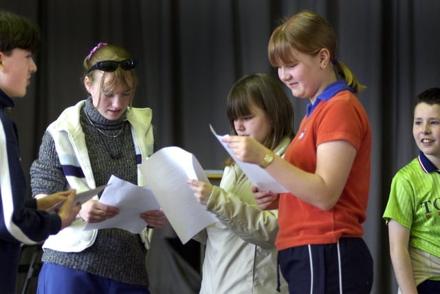 Pupils rehearse their play "First Day" in 2001