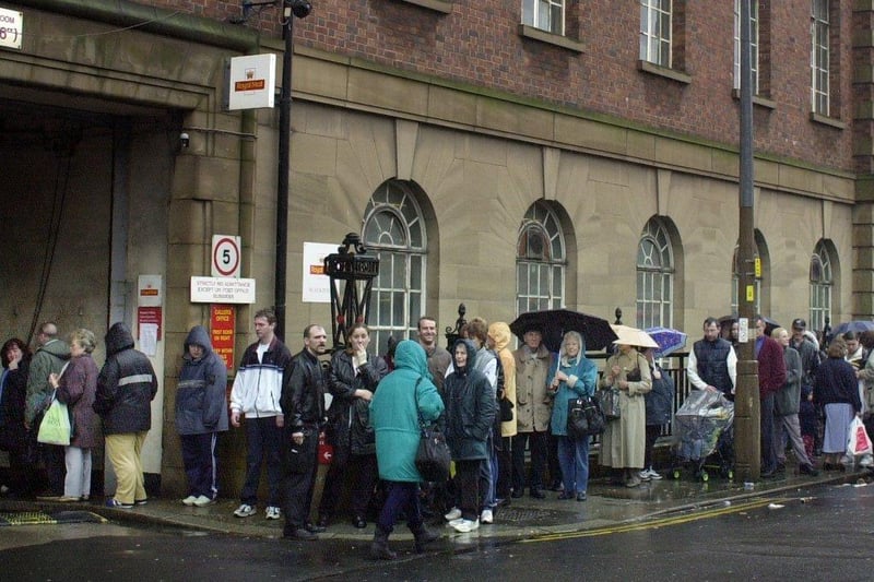 Queues at the rear of Blackpool Central Post Office as customers wait to pick up their mail, 2000