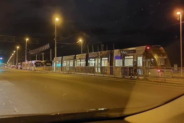 A man was arrested after a woman was struck by a car as she was crossing the tram tracks in Blackpool