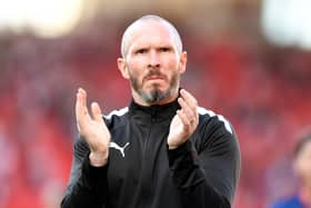 STOKE ON TRENT, ENGLAND - AUGUST 06: Blackpool Head Coach Michael Appleton applauds the fans after the final whistle during the Sky Bet Championship match between Stoke City and Blackpool at Bet365 Stadium on August 06, 2022 in Stoke on Trent, England. (Photo by Tony Marshall/Getty Images)