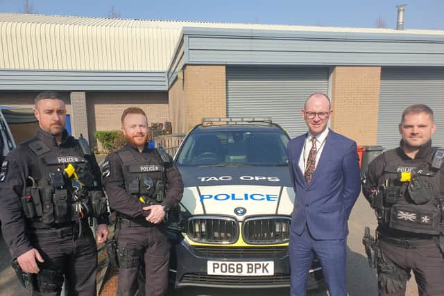 Lancashire Police and Crime Commissioner Andrew Snowden with officers from the county's armed response unit