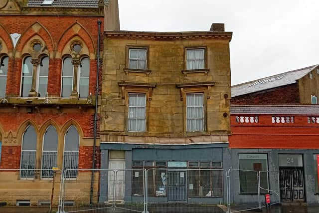 The building (centre) on Dock Street has been cordoned off for safety reasons, says Wyre Council