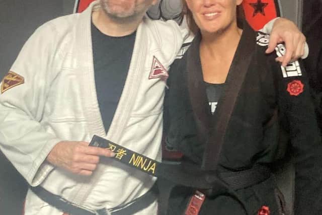 Black belt Hazel Winter with coach and business partner Gary Savage