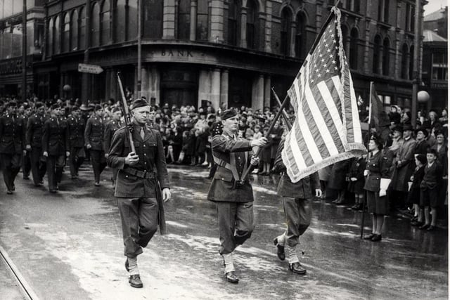 American serviceman stationed at Warton parading through Talbot Square in Blackpool, 1940s