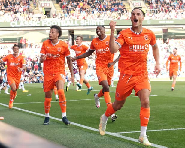 Jerry Yates scored his first goal of the season to earn Blackpool a point at Turf Moor