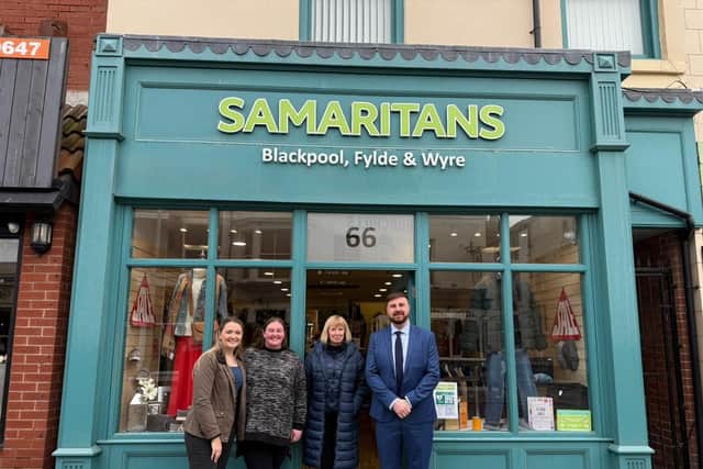 Chris Webb MP pictured alongside Blackpool Samaritans Branch Director Jade and dedicated volunteers, outside the charity shop on Topping Street