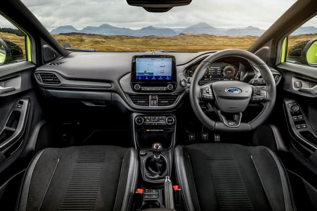 The Ford Puma ST's interior adds some sports seats and other ST-themed detail to the regular Puma interior