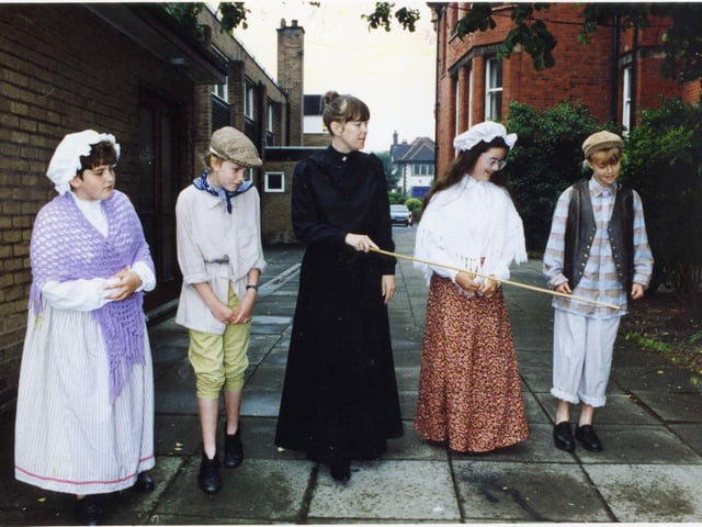 A walk in the school grounds in Victorian dress for actress Jodie Prenger (far left) with teacher Mrs Coyne and fellow pupils Claire Armstrong, Davina Clavering and Katie Thompson at Elmslie School, 1991