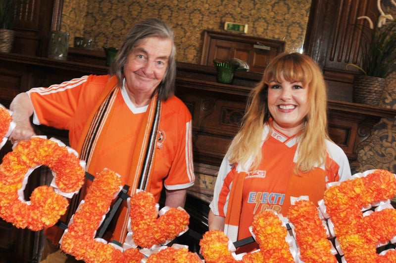 Mike Melody, antiques expert and presenter on Dickinson's Real Deal is a lifelong supporter. He is pictured with his daughter Victoria wearing their beloved tangerine shirts