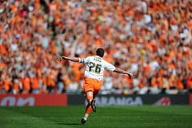 There's no doubting what Adam's most memorable moment in a tangerine shirt was...