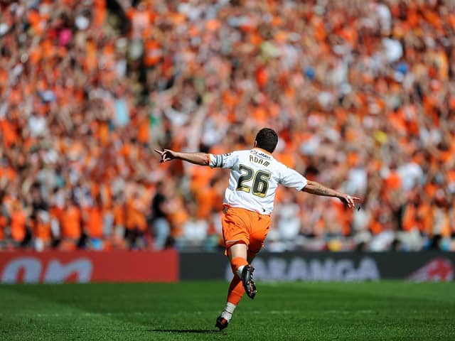 There's no doubting what Adam's most memorable moment in a tangerine shirt was...