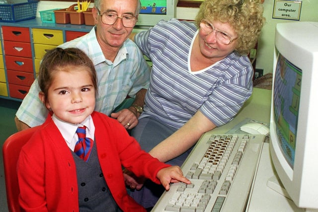 Grandparents Day at Clifton Primary School. Four year old Shelby Hughes showing grandparents Ronald and Hilda Harvey how the computers work