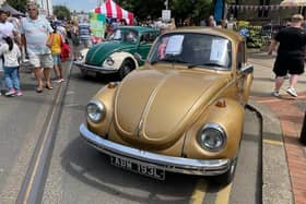 Classic vehicles like this gold VW Beetle will be included in Tram Sunday, as usual