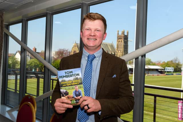Tom Pemberton with his first book 'Make Hay While The Sun Shines' at the launch event at Fylde Rugby Club earlier this year. Photo: Kelvin Stuttard