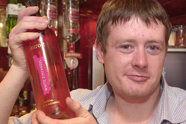 Frenchman's Cove manager Steve Mcgowan all ready for the bank holiday in 2004 with a bottle of White Zinfandel