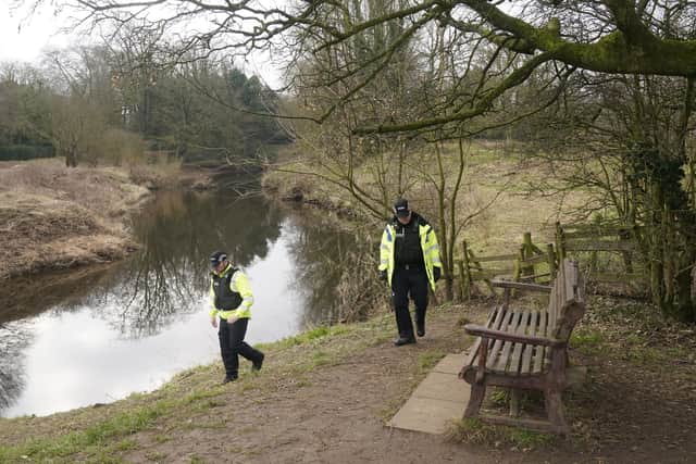 Police activity near the bench by the River Wyre where Ms Bulley's mobile phone was found (Credit: Danny Lawson/PA Wire)