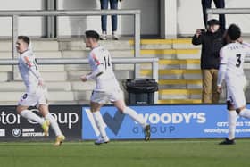 Nick Haughton celebrates his goal against King's Lynn Town but AFC Fylde were pegged back  Picture: STEVE MCLELLAN