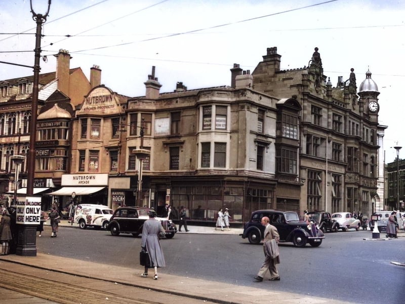 This colourised picture of the Promenade and Talbot Square from the mid 1950s has added a splash of colour to clothing. Across the Square there is a gimpse of Yates's Wine Lodge