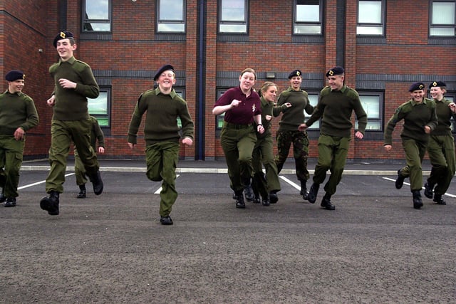 Cadet instructor Katie Finnegan (purple top) running with members of the Lancashire Army Cadet Force. Katie, who is also volunteer for Macmillan Cancer Support, and the cadets will be taking part in a fun run to help raise money for the Macmillan charity