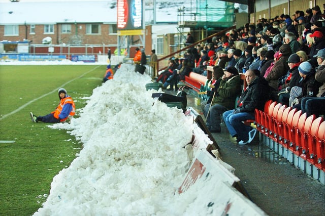 The snow cleared from the pitch for Fleetwood's game against Newport County in 2010