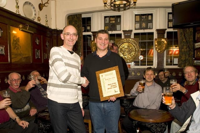 Ian Ward, branch chairman of Blackpool, Fylde and Wyre CAMRA presents the Pub of the Season, winter 2009, award to Ramsden Arms landlord Brian Luxton