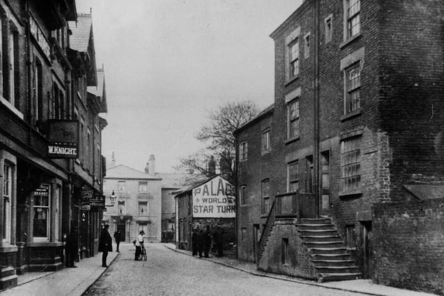The Golden Ball which was rebuilt at the turn of the 19th Century can be seen at the far end of Church Street it's archway to the right (not in view) once led to stables and the cattle market. The Bay Horse on the left later became the headquarters of Poulton Urban District Council but reverted to a pub by the name of The Old Town Hall. The buildings on the right with the well-worn steps have long since been demolished to reveal the raised churchyard of St Chad's