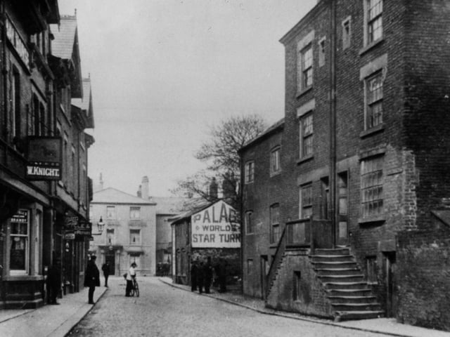 The Golden Ball which was rebuilt at the turn of the 19th Century can be seen at the far end of Church Street it's archway to the right (not in view) once led to stables and the cattle market. The Bay Horse on the left later became the headquarters of Poulton Urban District Council but reverted to a pub by the name of The Old Town Hall. The buildings on the right with the well-worn steps have long since been demolished to reveal the raised churchyard of St Chad's