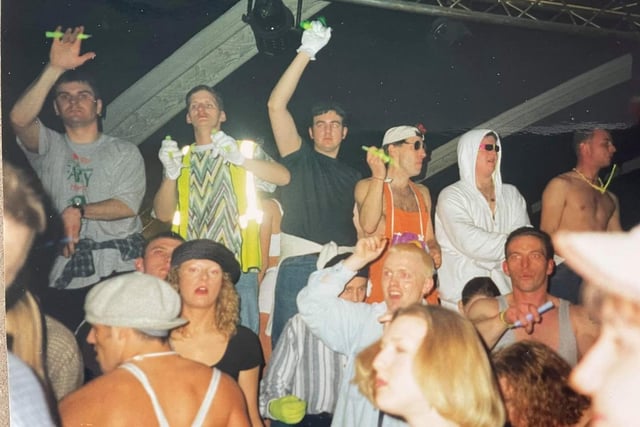 All glow sticks and white gloves - these guys were immersed in the music on the stage at Zone
