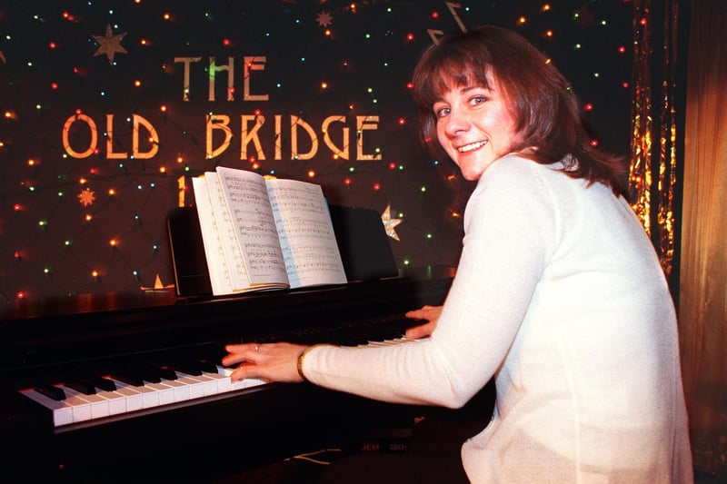 Landlady of the Old Bridge Denise Birtwistle, tunes up in preparation for the Lytham Road pub's battle of the bands competition in 2000