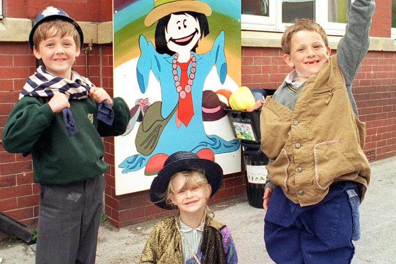 Six murals were donated to St Kentigerns RC Primary School, from painting and decorating students (level one -NVQ), at Blackpool and the Fylde College. In front of one of the murals, are from left, Robert  Haydon,  Lauren Turner and James Livesey