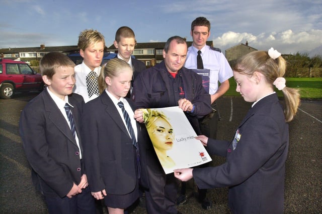This was the launch of "Operation Beware" in 2000. Pictured at Fleetwood High School, with a firework safety poster are from left - Steve Curwen, PC Emma Shuttleworth, Kelly Buchanan, Ben Telford, Fleetwood Fire Station Officer and Station Commander Kevin Jeynes, Sgt. Andy Webster and Kayleigh Ronan.