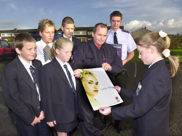 This was the launch of "Operation Beware" in 2000. Pictured at Fleetwood High School, with a firework safety poster are from left - Steve Curwen, PC Emma Shuttleworth, Kelly Buchanan, Ben Telford, Fleetwood Fire Station Officer and Station Commander Kevin Jeynes, Sgt. Andy Webster and Kayleigh Ronan.