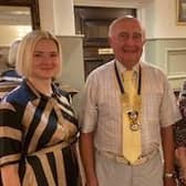 Olga Borysenko (left) and Zoe Barker-Moss with Kirkham Rotary president Richard Bell.