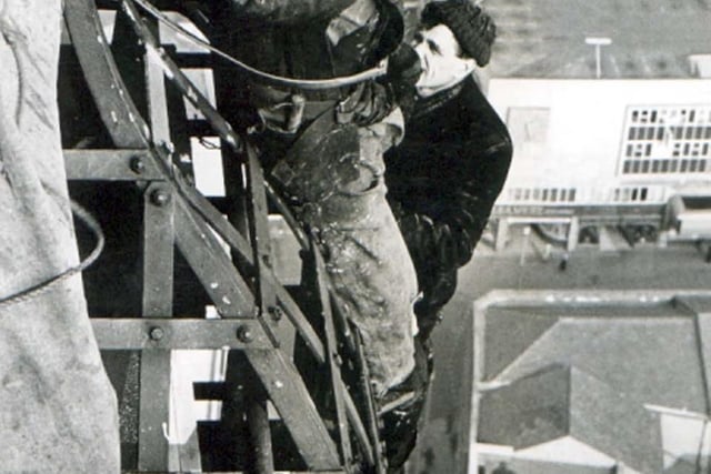 Another lick of paint should do it. These workmen are almost as close as you can get to the flagpole on Blackpool Tower, 1960