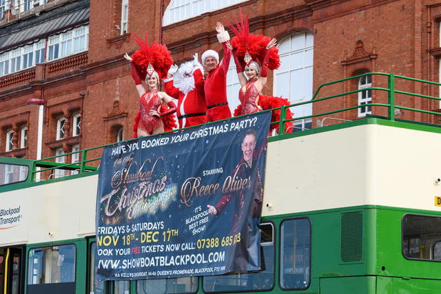 Reece Oliver and The Showboat Showgirls were joined by Santa Claus in an open top bus to celebrate the launch of their Christmas party nights and festive show. Photo: Kelvin Stuttard
