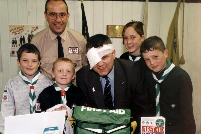 Stephen Whitehead from BNFL giving First Aid equipment to Blackpool Scout Group, 1998