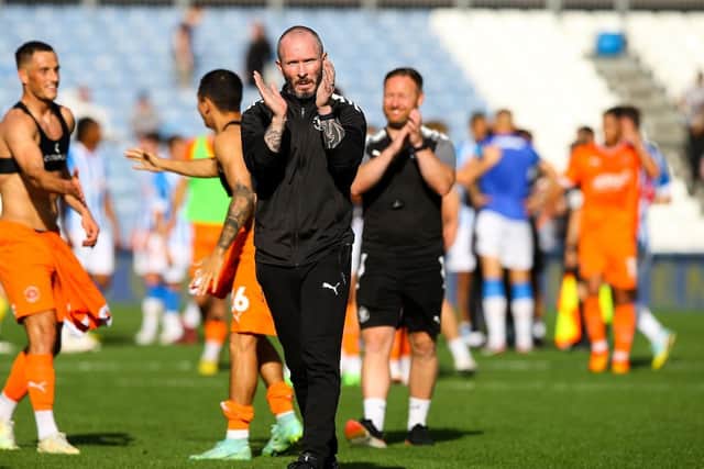 Michael Appleton applauds the Blackpool fans after last weekend's win against Huddersfield