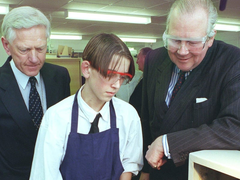 Lytham St Annes High School headteacher Michael Payner with Lord Lieutenant of Lancashire Lord Shuttleworth and Tomas Shepherdson working on a centre lathe