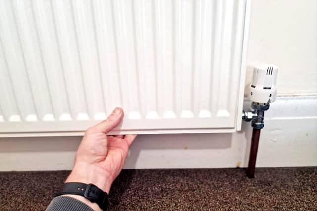 The thermostatic valve on a radiator can be adjusted to save energy. Photo Solar Panel Installation