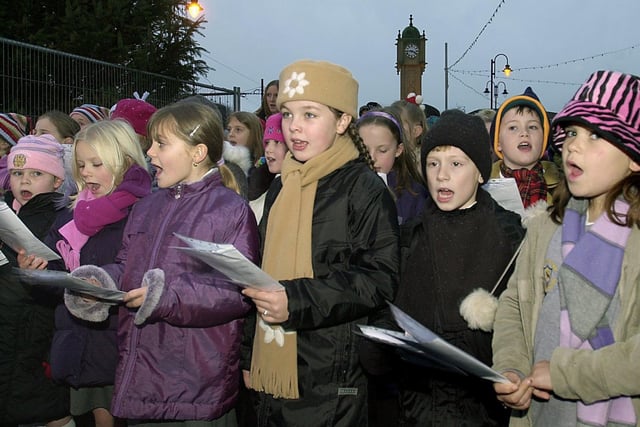 Children from Larkholme Primary School choir singing at Fisherman's Walk in 2002 for the Fleetwood Christmas lights switch-on