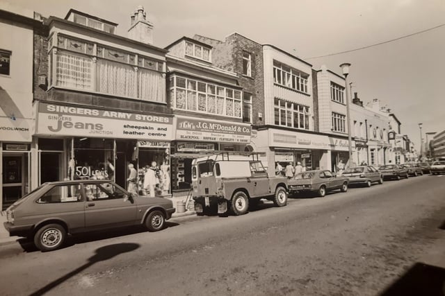 This was Topping Street in June 1987 - sheepskin and leather centre, an estate agent and a travel agents